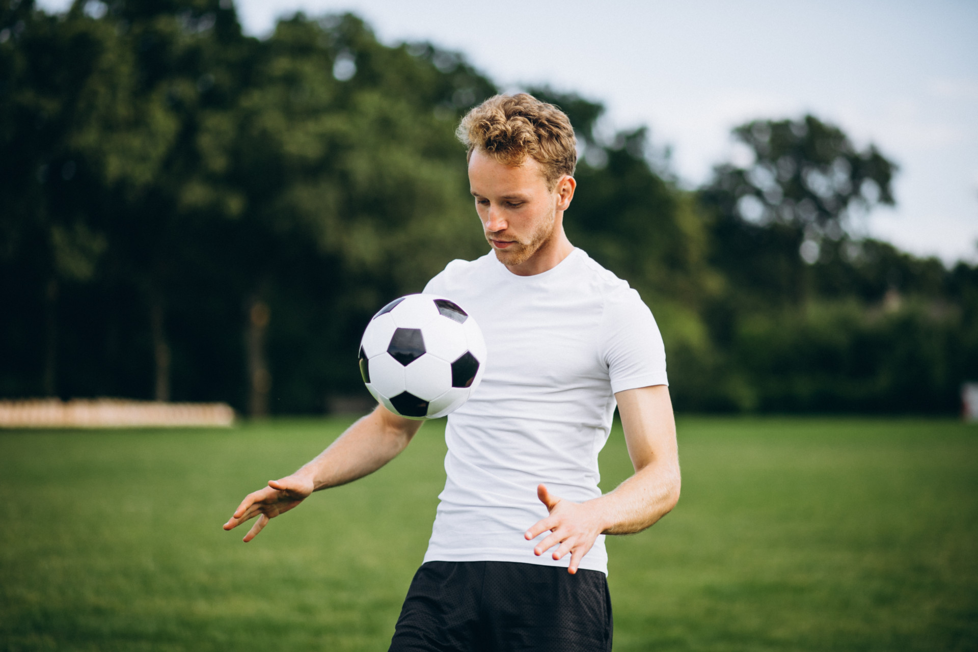 Young football player at the football field